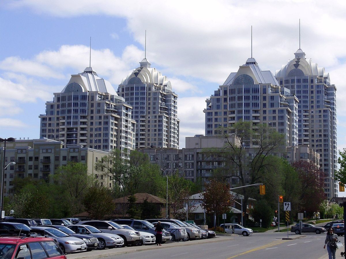 Condominium towers rising above houses south of Sheppard Avenue East in Bayview Village.